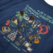 12 Days Hawaiian Christmas: Myna Bird, Coconuts, Squids, Lei, Pigs, Hula, Shrimps, Ukuleles, Pounds of Poi, Cans of Beer, Missionaries & TVs on Navy blue.