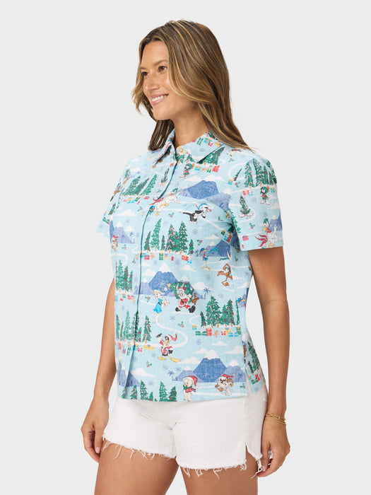 Women's Looney Tunes Abby Top left angle view buttoned up with Daffy Duck, Bugs Bunny, Sylvester, Porky Pig, Road Runner, and Wile E. Coyote dash through a playful winter wonderland.