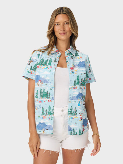 Women's Looney Tunes Abby Top front view unbuttoned over a white Tee with Daffy Duck, Bugs Bunny, Sylvester, Porky Pig, Road Runner, and Wile E. Coyote dash through a playful winter wonderland.
