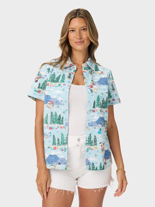 Women's Looney Tunes Abby Top front view unbuttoned over a white Tee with Daffy Duck, Bugs Bunny, Sylvester, Porky Pig, Road Runner, and Wile E. Coyote dash through a playful winter wonderland.