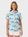 Women's Looney Tunes Abby Top front view buttoned up with Daffy Duck, Bugs Bunny, Sylvester, Porky Pig, Road Runner, and Wile E. Coyote dash through a playful winter wonderland.
