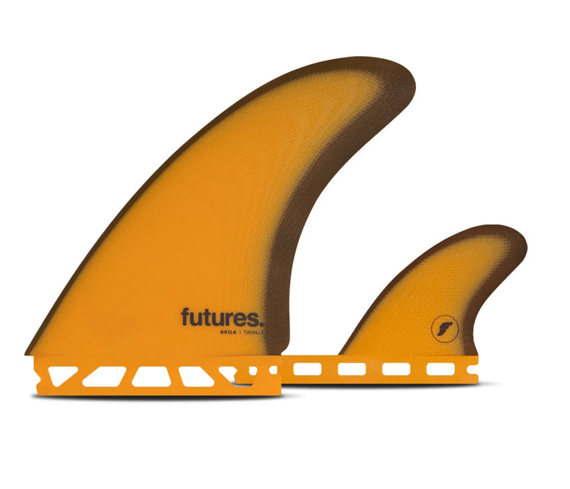 Akila solid Fiberglass Twin+1, designed by Hawaiian shaper Akila Aipa, twin-fin design with trailer, only 2 of 3 fins shown.