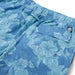 Aloha Biscus Draw String blue swim trunks with the flowers on a blue field back pocket zoom in.