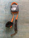 Dakine branded KAIMANA 5' x 3/16" orange & black Surfboard Leash including a urethane cord, a molded neoprene cuff and rail saver.