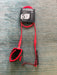 Dakine branded KAIMANA 5' x 3/16" red Surfboard Leash including a urethane cord, a molded neoprene cuff and rail saver.