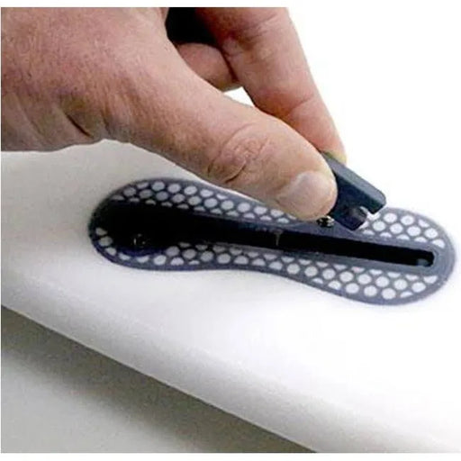 FCS II Side Plug Infill positioned above FCSII Fin Box with set screw installed but visible 