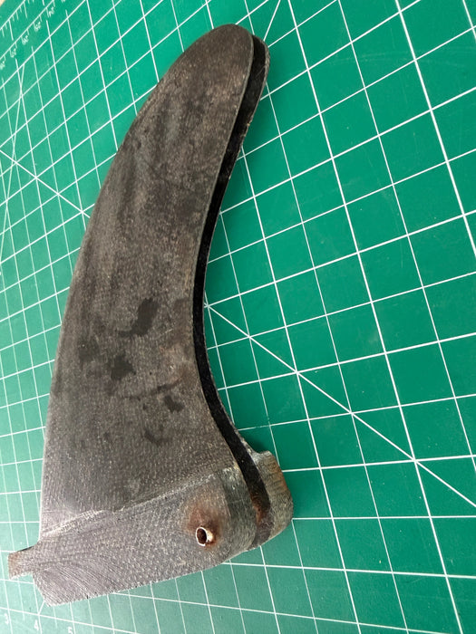 used Bahne Box base 4 3/8" twin fin set in black fiberglass showing separation by resting the fin pins.