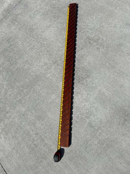 long wood base to display so many surfboard or sufing fins