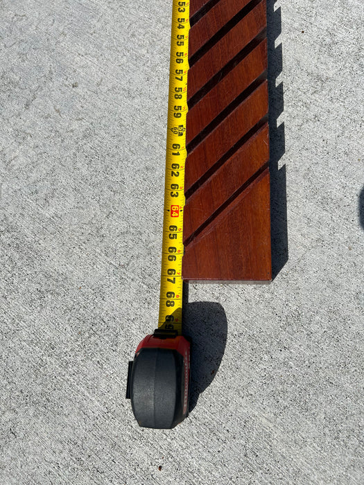 67" solid wood base to hold a lot of surf fins