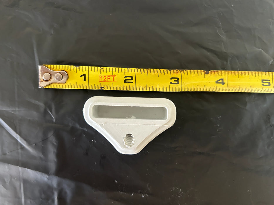 Futures Fins C5 Twinzer Fin Box
 white fin box measuring 2.5"x2.5" one top view with yellow ruler and no screw