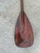 Hawaii grown Koa standup paddle blade with a cut to fit shaft front of blade