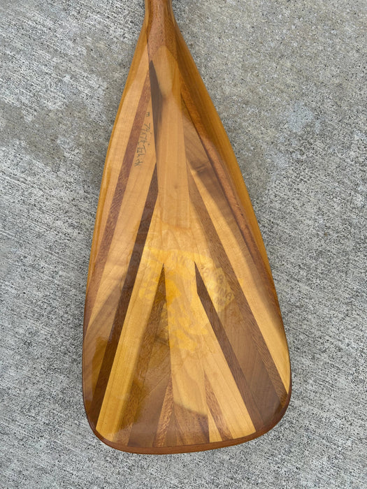 Hawaii grown Koa standup paddle blade with a cut to fit shaft back of blade