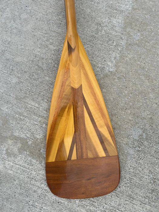 Hawaii grown White Koa standup paddle blade with a pre-cut shaft front of blade