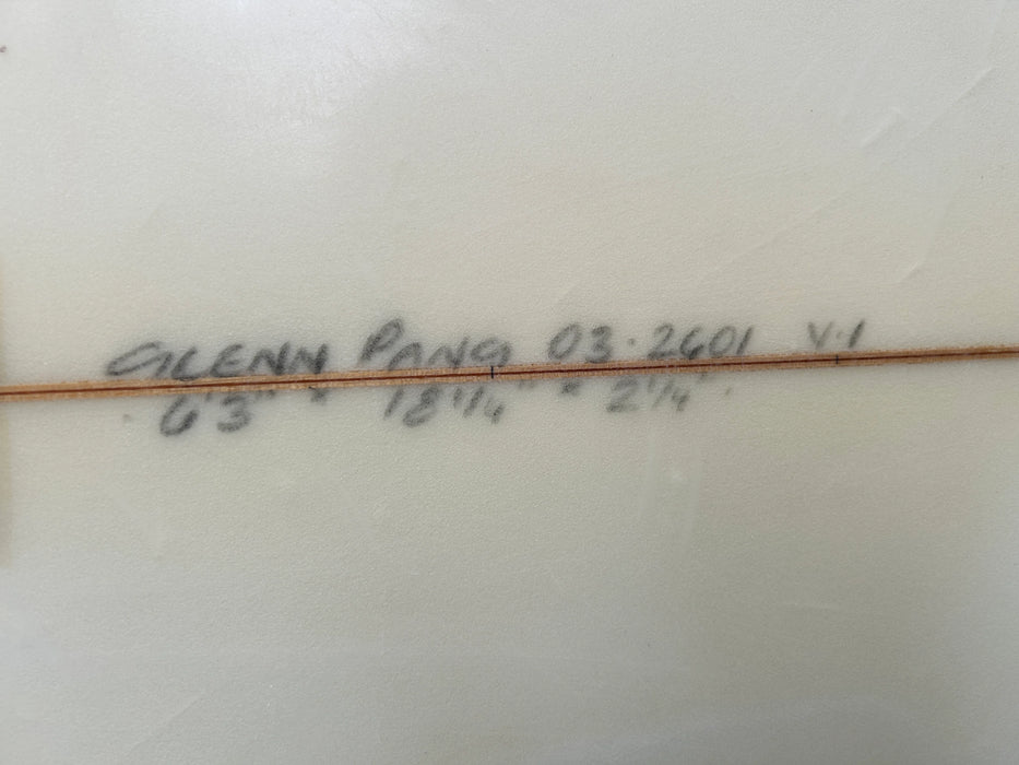 used signed Glen Pang 6'3" surfboard clear with FCS brand fin plugs zoom in on dimension 