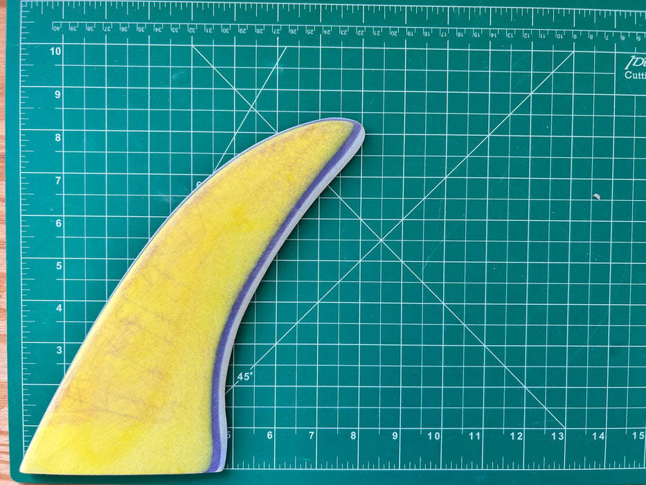 8 1/2" yellow, blue and clear used  fiberglass glass on center fin