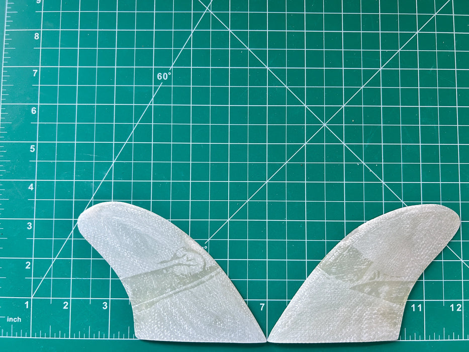 3 1/2" translucent fiberglass used glass on twin fins or side bites on a green grid