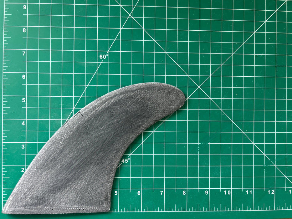 Used 5 5/8" Black fiberglass Glass On Single Fin wth 4 3/4" base