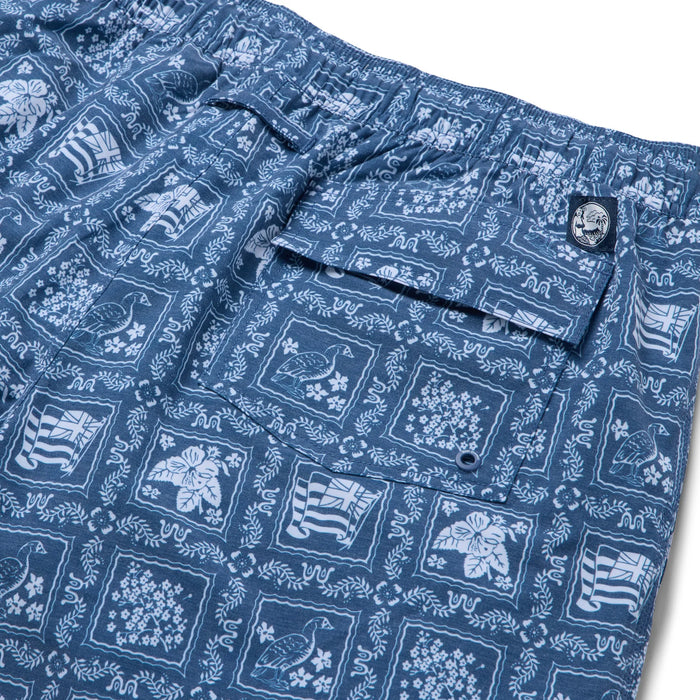 Lahaina Sailor Draw String red swim trunks with the Hawaii flag, flowers and nene back pocket zoom in.