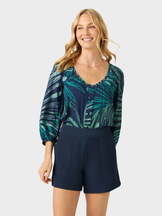 Phoebe Top in the Loulu Fronds print is a relaxed fit button front blouse with a scoop neckline finished with self fabric binding front view tucked in.