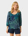 Phoebe Top in the Loulu Fronds print is a relaxed fit button front blouse with a scoop neckline finished with self fabric binding front view.