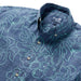 Reyn Spooner DressBlues Monstera Ink  Collared Shirt zoom in monstera, a broad tropical leaf, & hibiscus, the Hawai'i state flower