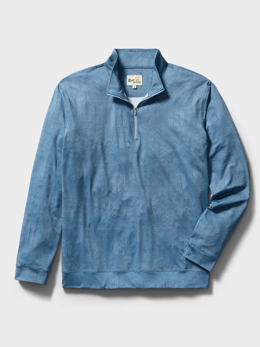 A blue Tapa pattern quarter zip moisture wicking pullover with a stand collar and long sleeves.