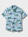 Light blue collared buttoned up Aloha shirt featuring Looney Tunes cartoon characters Bugs Bunny, Sylvester and many others front view Tailored style.