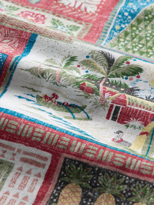 Super zoom in on a scene of a beached sea canoe with presents with an ama in front of a Hale with a Christmas decorated palm tree in red theme.
