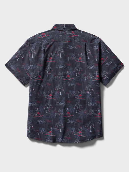 Surfin' Santa Performance Button Front Collared Short Sleeve Charcoal colored Aloha Shirt depicts Santa Surfing Waikiki with Diamondhead in the background back view.