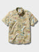 A short-sleeve button-up collared tailored shirt with an all-over khaki fabric map print featuring Route 66 motifs, illustrated landmarks, and small colorful details.
