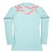 Chic women’s cyan colored long sleeve rashguard with white and pink four strand Hawaii  flower lei back view