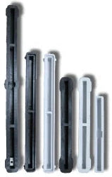 A few of several different lengths of black and white Bahne fin boxes that have been available in the past.