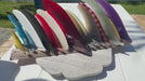 clear coated curved ohia wood 15 surfboard fin slot display with fins