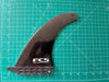 used 7" black plastic FCS Dolphin Surfboard or Stand Up Paddleboard center fin.