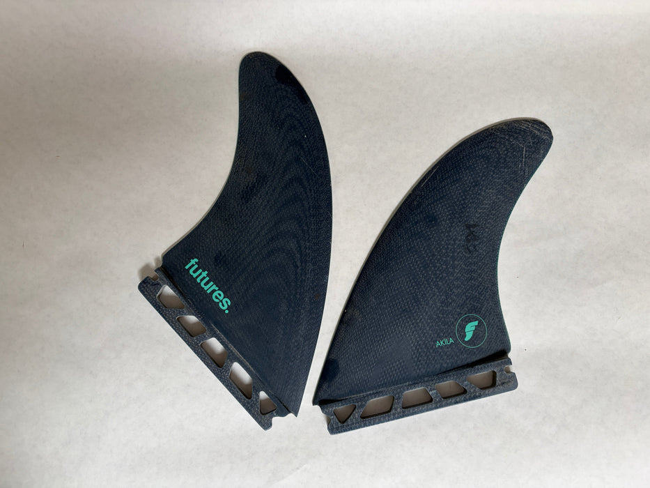 Used Akila Aipa Futures Twin Fin set of two surfboard fins in teal and blue fiberglass outside view