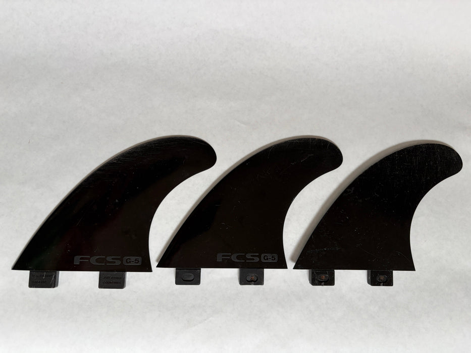 used FCS medium surfboard fins
